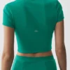Alo Softsculpt T-shirt met korte mouwen en doorlopende rits – Emerald Isle
