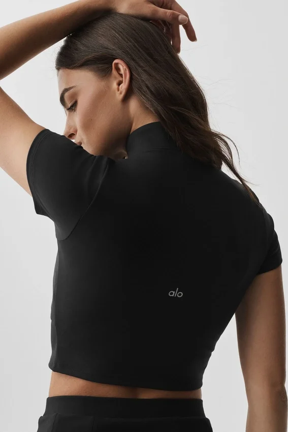 Alo Softsculpt T-shirt met korte mouwen en doorlopende rits - Zwart