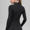 Geribbeld Mesmerize-shirt met hoge kraag en lange mouwen – Zwart