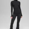 Geribbeld Mesmerize-shirt met hoge kraag en lange mouwen – Zwart