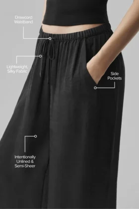 Halfdoorzichtige ‘Golden Hour’-broek met High-Waist en rechte pijpen – Zwart