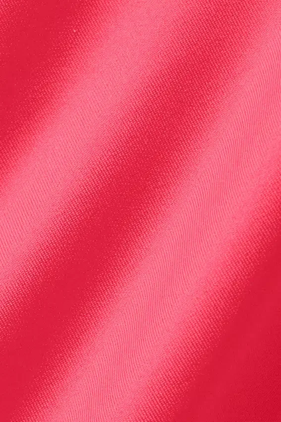 High-Waist Airlift Supergladde capri met contrast — Candy Red/White