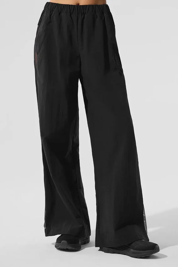 High-Waist trainingsbroek met wijde pijpen - Zwart