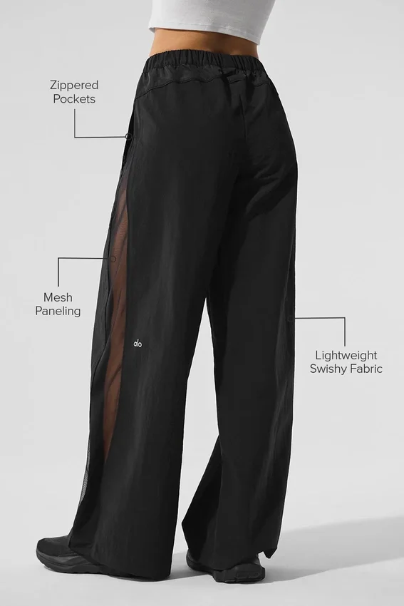 High-Waist trainingsbroek met wijde pijpen - Zwart