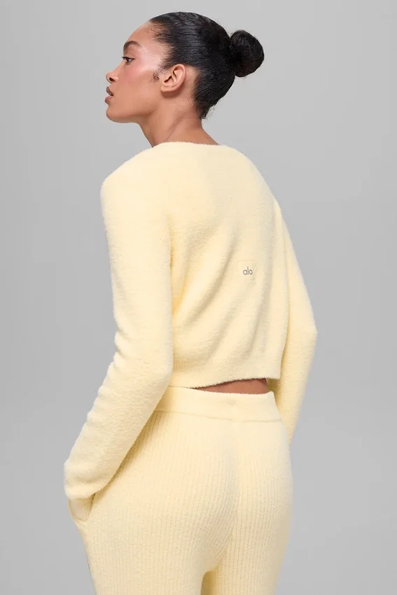 Snuggle up Truie kort vest - kaarslichtgeel