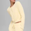 Snuggle up Truie kort vest - kaarslichtgeel